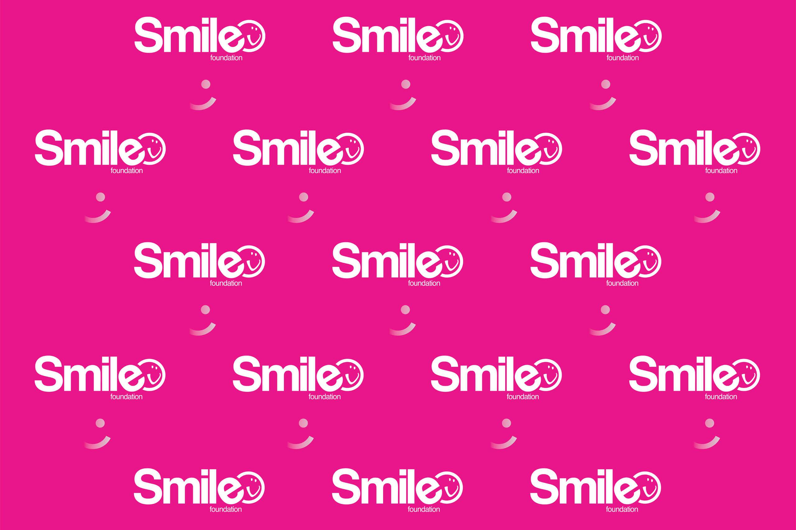 Smile Logo repeating pink background placeholder